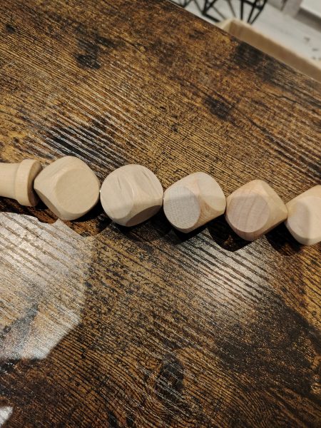 Rouleau de massage en bois formé de des marque tulli