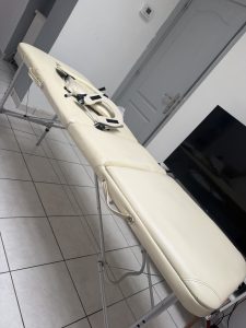Table de massage avec accessoires